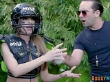 Busty cougar outdoors in sporty costume